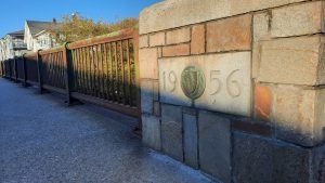 bridge railing with 1956 engraved in stone